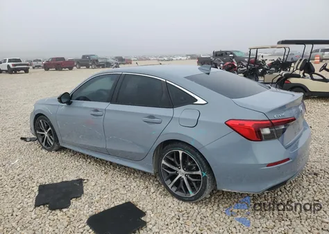 2022 Honda Civic Touring z USA, uszkodzony, nr VIN 2HGFE1F95NH321513